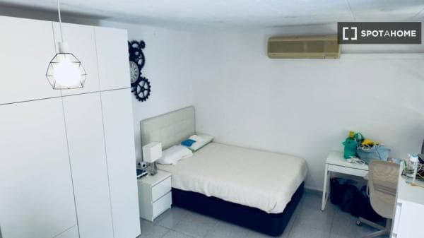 Habitación en piso compartido en Granollers photo 1