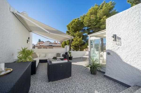 Chalet adosado en venta en Barrio La Dama de Noche-La Alzambra , Marbella photo 1
