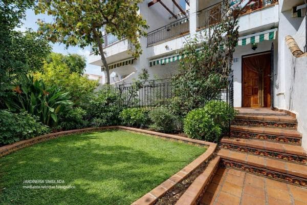 Chalet adosado en calle Dunas photo 1