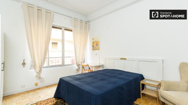 Elegant room in shared apartment in Malasaña, Madrid