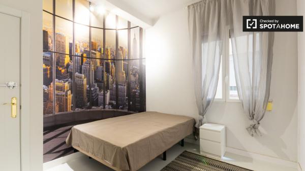 Elegant room in shared apartment in Malasaña, Madrid