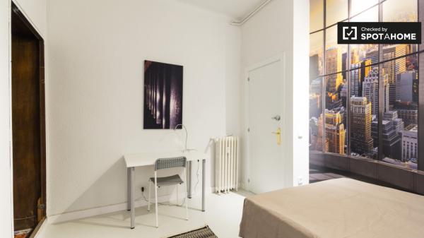 Elegant room in shared apartment in Malasaña, Madrid