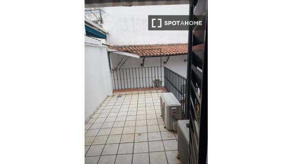 Quarto privado com pátio em casa incrível em Sevilha